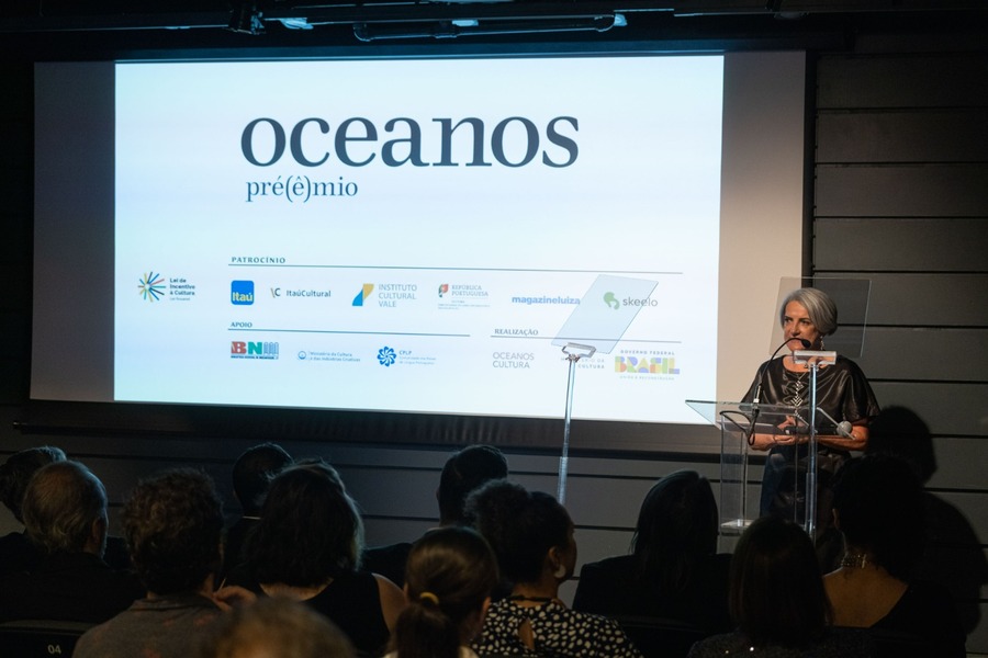 Selma Caetano, a coordenadora do Oceanos, abrindo a cerimônia de anúncio dos vencedores 2023, no Itaú Cultural | © Agência Ophélia Selma Caetano, a coordenadora do Oceanos, abrindo a cerimônia de anúncio dos vencedores 2023, no Itaú Cultural | © Agência Ophélia